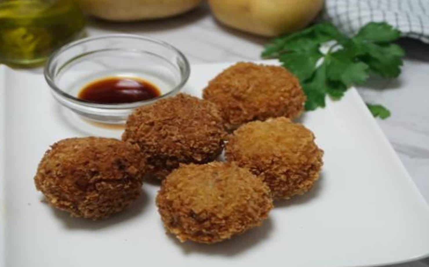 Croquetes no Prato