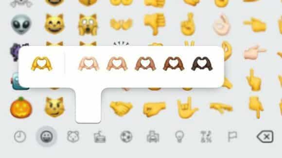 WhatsApp: o que realmente significa o emoji das mãos formando um coração