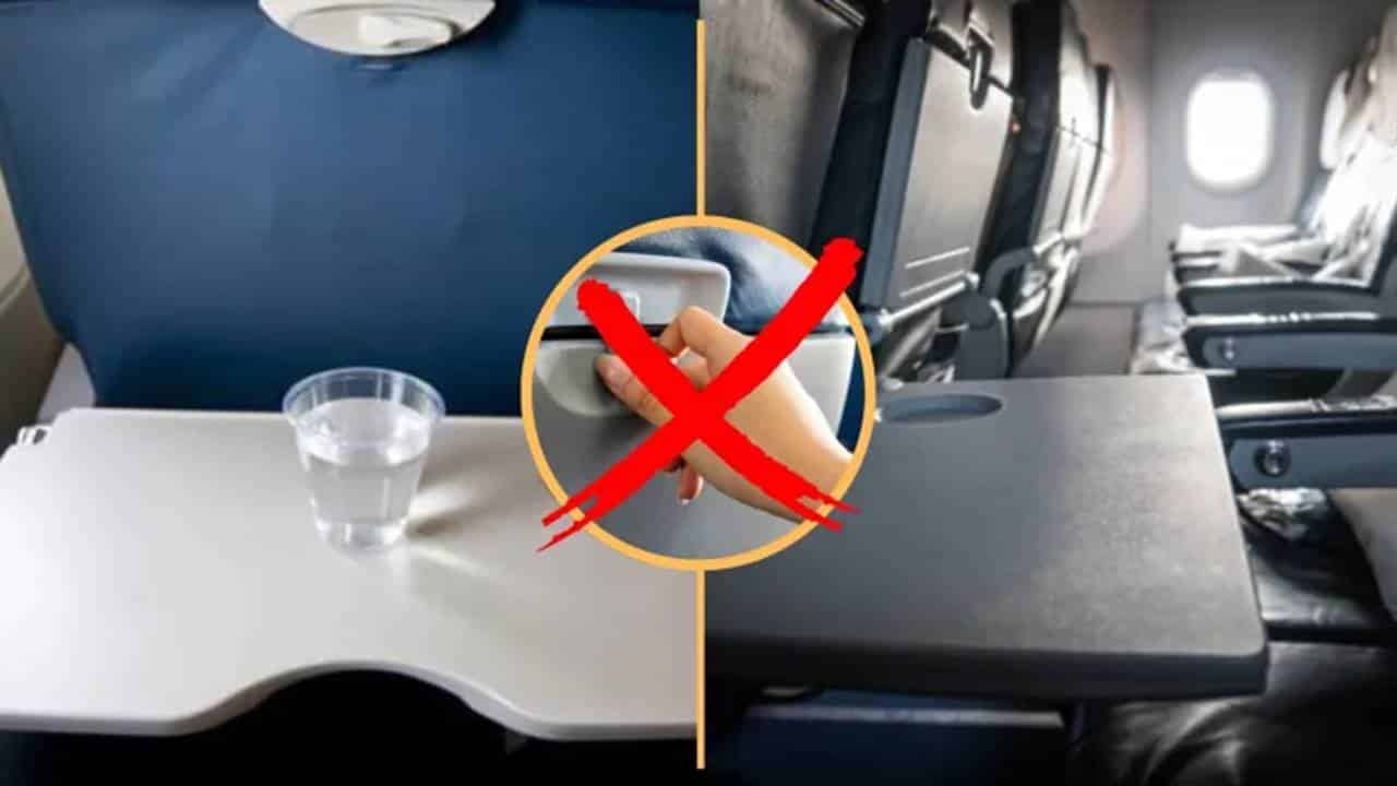 A razão chocante para não colocar alimentos nas bandejas traseiras de assento de avião