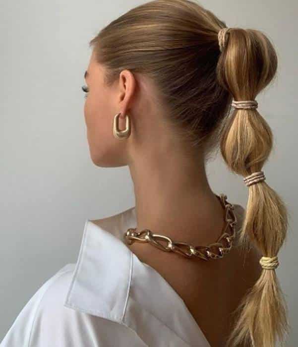 cabelo com penteado de rabo de cavalo bolha