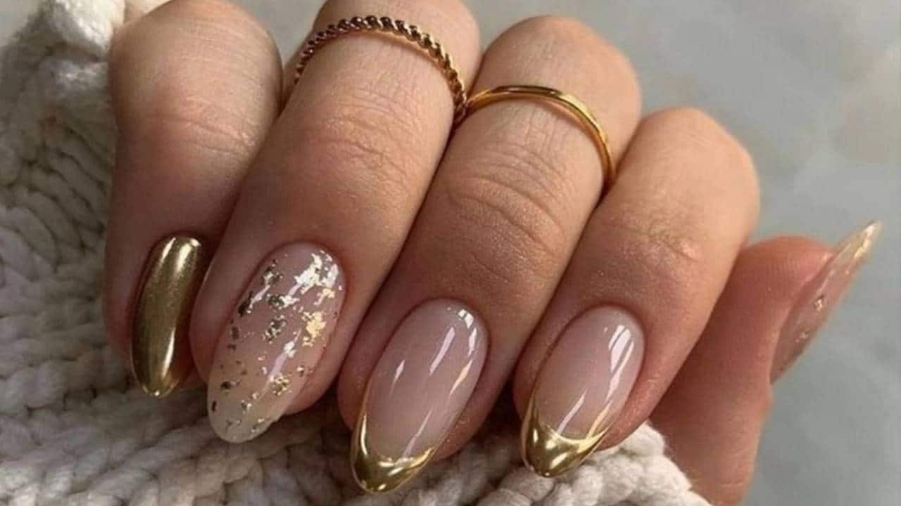 designs de unhas douradas elegantes